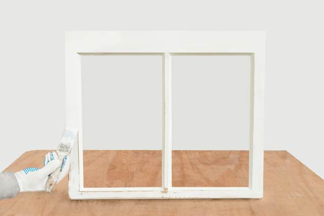 A re-corded and draught proofed white timber sash window